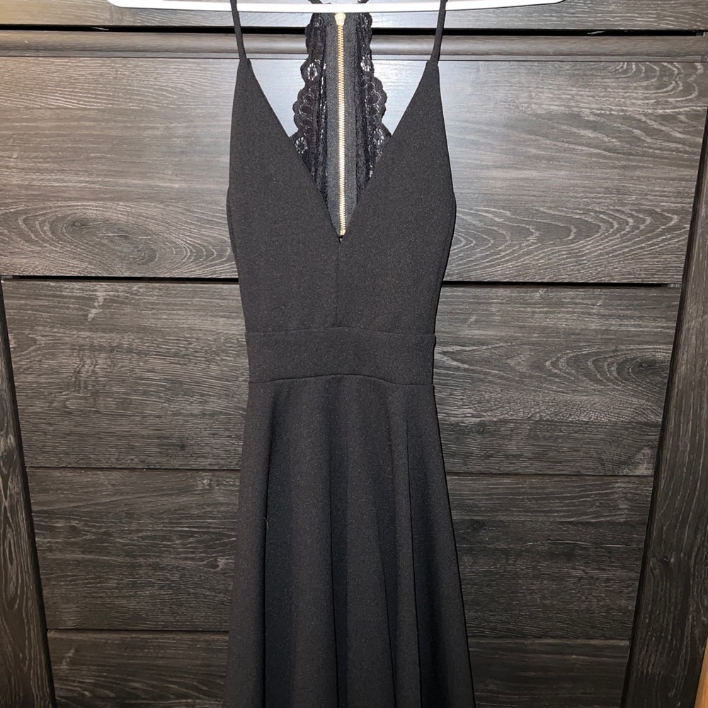 Graceful high-low black dress. Only worn once!